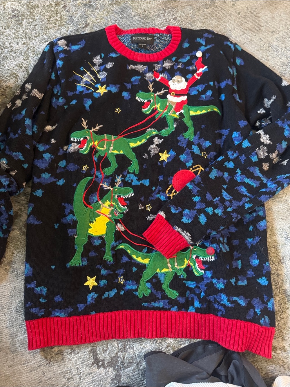 Blizzard Bay Men’s Black Crewneck Sweater with Green Dinosaur Holiday Applique